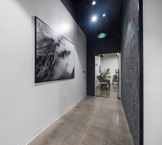 PLUNJ Boise hallway with mountain art